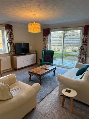 a living room with a couch and a coffee table at The Wright 1 bedroom place to stay large drive in East Harling