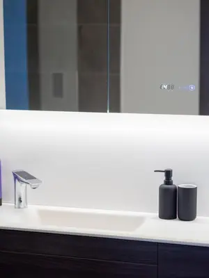 a bathroom with a white sink with a mirror at Cosy 2-Bed Next to Harlow Town in Harlow