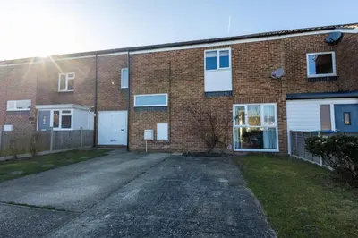 an empty parking lot in front of a brick building at Sizewell - Lincoln - Contractor Accommodation in Saxmundham