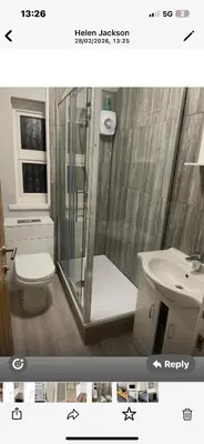 a bathroom with a shower and a toilet and a sink at Leiston house in Leiston