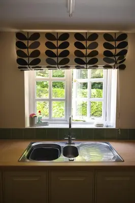 a kitchen with a sink and a window at Cosy Rural Retreat Perfect for Families and Pets in Tuddenham