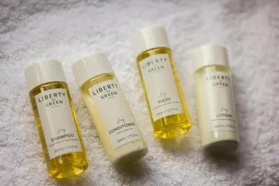 three bottles of essential oils sitting on a towel at Crown & Punchbowl in Cambridge