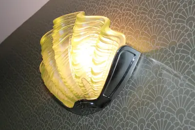 a yellow cell phone sitting on a table at The PitStop in Bishops Stortford