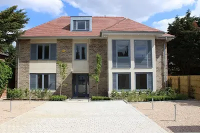 a brick house with a red roof at Citystay Living - Pringle House in Cambridge