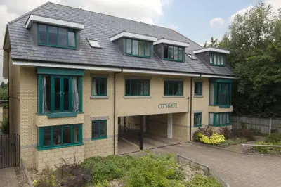 a large house with a gambrel roof at Citystay Living - Citygate in Cambridge
