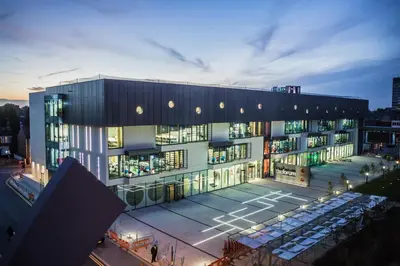 a building with a tennis court in front of it at University of Essex - Southend Campus in Southend-on-Sea