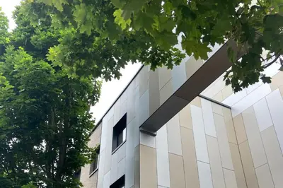 a white building with trees in front of it at University of Essex - Southend Campus in Southend-on-Sea