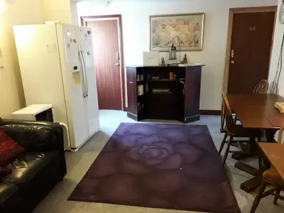 a living room with a couch and a table at Lantern House in Cambridge