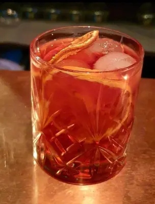 a drink in a glass sitting on a table at White Horse in Maldon