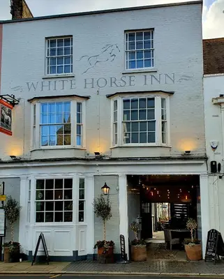 a white horse inn on a city street at White Horse in Maldon