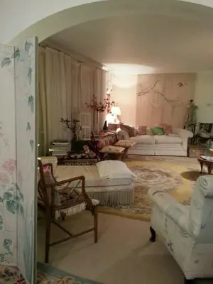 a living room with a couch and a chair at Folly Studio Bed and Breakfast in Bungay