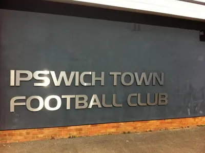 a sign for the foshan town football club at Wherstead House in Ipswich