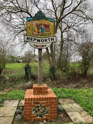 a sign on top of a brick block at Maltings Loft in Hepworth