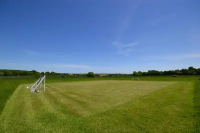 a soccer field with two goal nets in a field at Little Bullocks Farm in Takeley