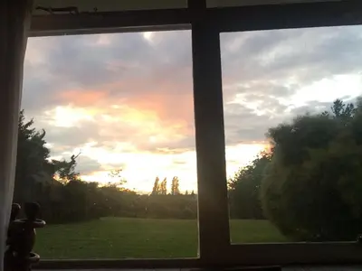 an open window with a view of a field at Private luxury retreat in Sible Hedingham