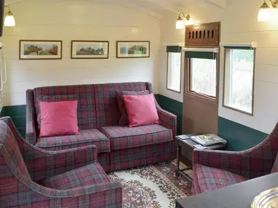 a living room with a couch and two chairs at Wilby Halt-Ukc712 in Wetheringsett