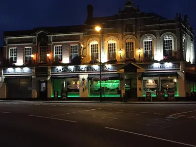 a building on a street at night at The Dorrington in Halstead