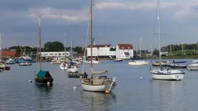 a group of boats in a marina in the water at Saurden Guest Apartment in Ipswich
