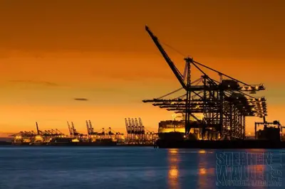an oilfield with a sunset in the background at Saurden Guest Apartment in Ipswich