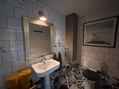 a bathroom with a sink and a toilet at Worth House in Cambridge