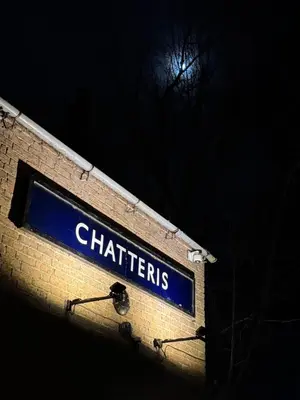 a blue street sign on the side of a brick building at Cross Keys Hotel Chatteris in Chatteris