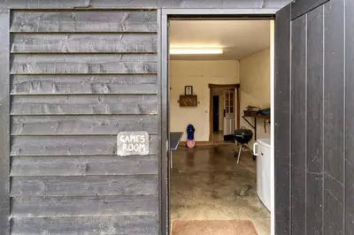 an open door to a room with a garage at The Buttery in Freston