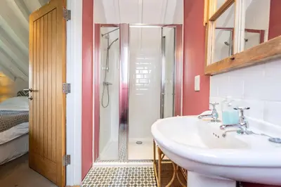 a bathroom with a sink and a shower at Lodge Farm in Freston
