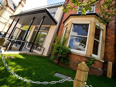 a house with a chain in front of it at YHA Cambridge in Cambridge