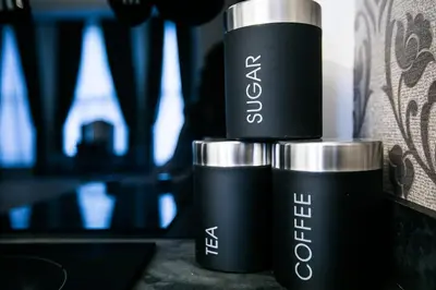 two black and silver cups stacked on top of each other at Apartments at Number 10 The Abbey in Norwich