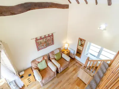 an overhead view of a living room with a couch at Norbank Cottage in Bressingham
