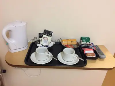 a tray with two cups and saucers on a table at The Black Bull Inn in Fyfield
