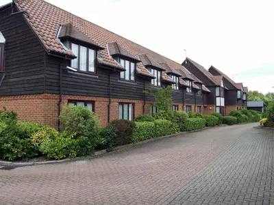 a row of houses on a brick road at The New Chichester Hotel in Wickford