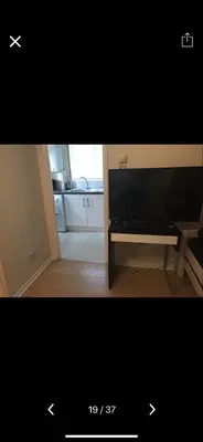 a picture of a living room with a flat screen tv at Waltham Abbey Private Property in Waltham Abbey