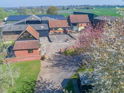 an aerial view of a village with a building at Old Dairy - Ukc3169 in Walpole