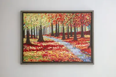 a painting of a path through a forest with autumn leaves at Modern & Exquisite Trumpington Townhouse with Parking & 5 mins to Papworth hospital in Cambridge