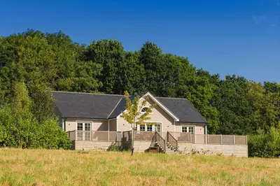 a house in the middle of a field at Ransom Lodge in Chappel