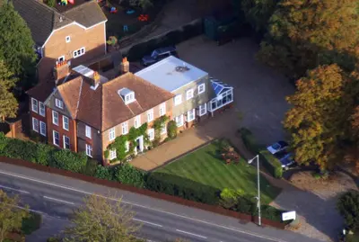 an aerial view of a large house on a street at Sherbourne House in Attleborough