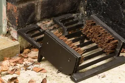 a pile of wood sitting on top of a grill at Owl's Hoot in Thorndon