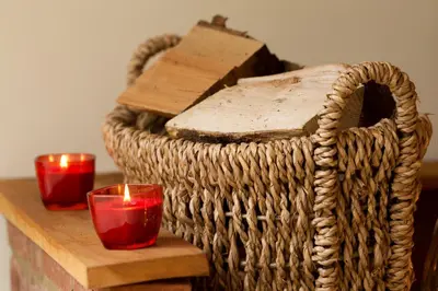 a basket with two candles and two red votives at Owl's Hoot in Thorndon