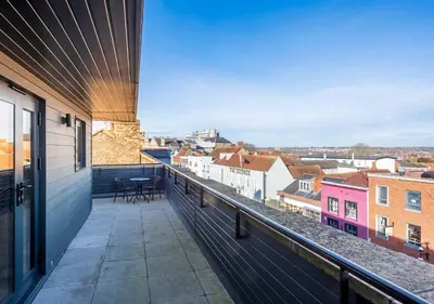 a balcony with a view of a city at St Nicholas Hotel Colchester in Colchester