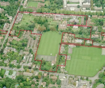 an overhead view of a park with red structures at Newnham College - University of Cambridge in Cambridge