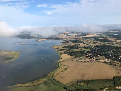an aerial view of a large body of water at Marsh View Cottage, Aldeburgh in Aldeburgh