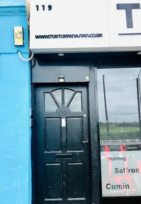 a black door in the side of a bus at AC Hideout in Rochford