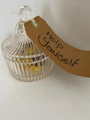 a clear glass jar with a sign on it at Ship Stores B&B in Clare