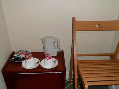 a table with a blender and two tea pots on it at Carlton Lodge in Cambridge