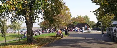 a group of people walking in a park at The Blue Boar - Maldon in Maldon