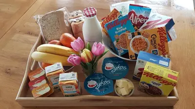 a tray filled with food and snacks on a table at Spring Paddocks B&B in Furneux Pelham