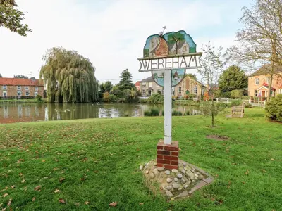 a street sign in the middle of a field at The Old School in Wereham