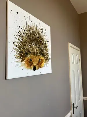a painting of a hedgehog on a wall at The Bell Inn, Rickinghall in Rickinghall