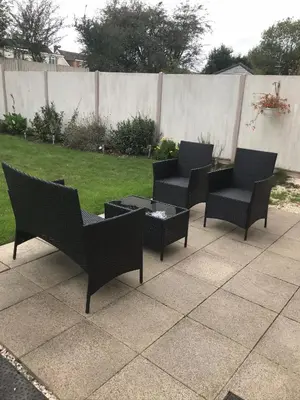 a group of chairs and a table on a patio at Villa Belle Three bedrooms Basildon in Basildon